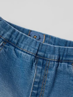 Dra på byxa denim baby